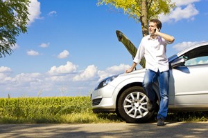 Broken Down Man Using Telephone